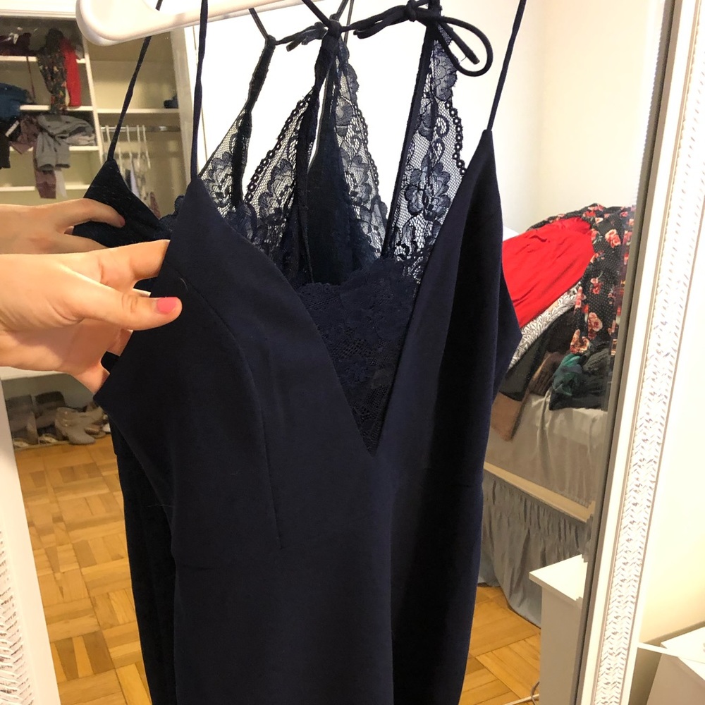 Navy bodycon with sheer lace v neck